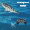 Remote control simulation of Canglong model water splashing and swaying in the water , outdoor toys in the swimming pool